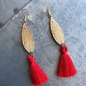 Gold finish BaubleBar earrings w/ red tassels